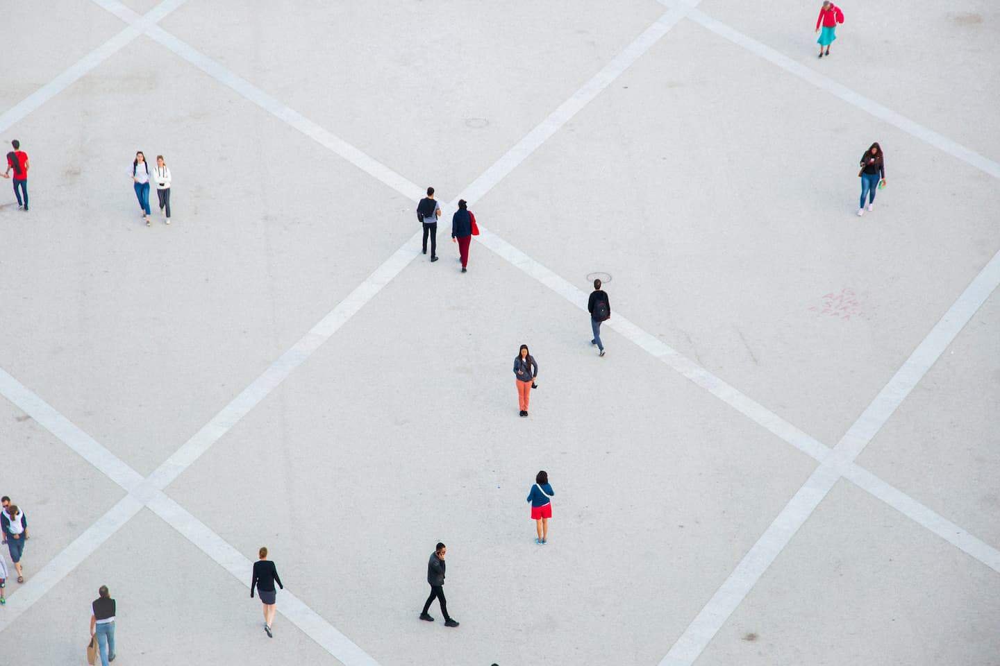 Image of Gen Z people walking across a plaza